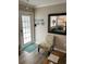 Entryway with a chair, mirror, and coat rack at 1603 Gulf N Dr # 27, Bradenton Beach, FL 34217