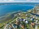 Expansive aerial showcasing waterfront community at 1707 Palma Sola Blvd, Bradenton, FL 34209