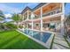 Modern two-story home with a refreshing pool at 1707 Palma Sola Blvd, Bradenton, FL 34209
