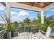 Relaxing balcony with water views and comfortable seating at 1707 Palma Sola Blvd, Bradenton, FL 34209