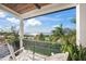 Relaxing balcony with water views and comfortable seating at 1707 Palma Sola Blvd, Bradenton, FL 34209