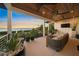 Spacious balcony with sunset view and comfortable seating at 1707 Palma Sola Blvd, Bradenton, FL 34209