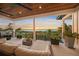 Serene balcony offering sunset views and outdoor seating at 1707 Palma Sola Blvd, Bradenton, FL 34209