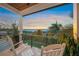 Balcony boasts amazing sunset views and comfortable seating at 1707 Palma Sola Blvd, Bradenton, FL 34209