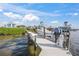 Private dock with a boat lift and additional features at 1707 Palma Sola Blvd, Bradenton, FL 34209
