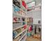 Well-organized closet with shelves and hanging rods at 1707 Palma Sola Blvd, Bradenton, FL 34209