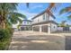 Spacious three-car garage with ample driveway parking at 1707 Palma Sola Blvd, Bradenton, FL 34209