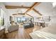 Open concept living room with hardwood floors and water views at 1707 Palma Sola Blvd, Bradenton, FL 34209