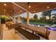 Enjoy sunset dinners in this outdoor dining area near the pool at 1707 Palma Sola Blvd, Bradenton, FL 34209