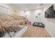 Beach-themed playroom with a custom bed and plenty of toys at 1707 Palma Sola Blvd, Bradenton, FL 34209