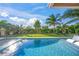 Inviting pool and patio area, perfect for outdoor entertaining at 1707 Palma Sola Blvd, Bradenton, FL 34209