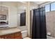 Simple bathroom with a shower and a view of the bedroom at 17109 1St E Dr, Bradenton, FL 34212