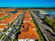Wide aerial view of community and landscape at 17322 Holly Well Ave, Wimauma, FL 33598