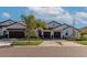 Three-unit building showcasing Mediterranean style architecture at 17322 Holly Well Ave, Wimauma, FL 33598