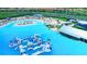 Large community pool with water features at 17322 Holly Well Ave, Wimauma, FL 33598
