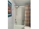 Bathroom with shower/tub and neutral tile at 2220 Stickney Point Rd # 537, Sarasota, FL 34231