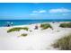 Public beach with people enjoying the sand and water at 2220 Stickney Point Rd # 537, Sarasota, FL 34231