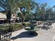 Relaxing courtyard with a tiered fountain and seating at 2220 Stickney Point Rd # 537, Sarasota, FL 34231