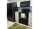 Black appliances and granite countertops in this updated kitchen at 2220 Stickney Point Rd # 537, Sarasota, FL 34231