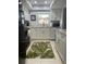 Modern kitchen with granite countertops and stainless steel appliances at 2220 Stickney Point Rd # 537, Sarasota, FL 34231