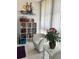 Bright sunroom with comfy seating and decorative wall art at 2220 Stickney Point Rd # 537, Sarasota, FL 34231