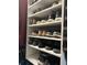 Custom closet with shoe storage and hanging space at 2220 Stickney Point Rd # 537, Sarasota, FL 34231