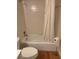 Bathroom with a bathtub, toilet, and shower at 2753 Orchid Oaks Dr # 104, Sarasota, FL 34239