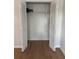 Additional closet with bi-fold doors and shelving at 2753 Orchid Oaks Dr # 104, Sarasota, FL 34239