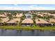 Aerial view of community by the lake at 288 Fairway Isles Ln, Bradenton, FL 34212