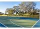 Full-size outdoor basketball court with blue accents at 288 Fairway Isles Ln, Bradenton, FL 34212