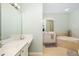 Large bathroom with double sinks and a soaking tub at 288 Fairway Isles Ln, Bradenton, FL 34212