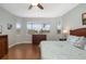 Spacious Primary bedroom with water views, large windows, and hardwood floors at 288 Fairway Isles Ln, Bradenton, FL 34212