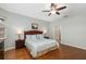 Bright bedroom with hardwood floors and ceiling fan at 288 Fairway Isles Ln, Bradenton, FL 34212