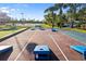 Community cornhole court with blue boards at 288 Fairway Isles Ln, Bradenton, FL 34212