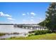 Serene pier overlooking a tranquil lake at 288 Fairway Isles Ln, Bradenton, FL 34212