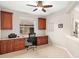 Home office with built-in desk and cabinets at 288 Fairway Isles Ln, Bradenton, FL 34212