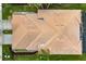 Aerial view of a house with a clay tile roof at 288 Fairway Isles Ln, Bradenton, FL 34212