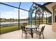 Spacious screened patio overlooking a lake at 288 Fairway Isles Ln, Bradenton, FL 34212
