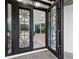 View of the home's interior through an open double-door entry at 3178 Dick Wilson Dr, Sarasota, FL 34240