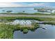 Three-story waterfront homes with boat dock and bridge view at 3524 Walker Is, Bradenton, FL 34208