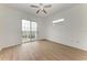 Bright bedroom with sliding glass doors leading to a balcony at 3524 Walker Is, Bradenton, FL 34208
