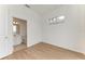 Bright bedroom with wood-look floors and ensuite bathroom at 3524 Walker Is, Bradenton, FL 34208
