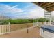 Spacious deck with hot tub and tranquil water views at 3524 Walker Is, Bradenton, FL 34208