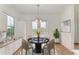 Bright dining area with hardwood floors and balcony access at 3524 Walker Is, Bradenton, FL 34208