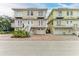 Two-story house with brick driveway and balconies at 3524 Walker Is, Bradenton, FL 34208