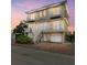 Two-story house with double doors, balconies, and a two-car garage at 3524 Walker Is, Bradenton, FL 34208
