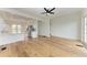 Open concept kitchen with stainless steel appliances and hardwood floors at 3524 Walker Is, Bradenton, FL 34208