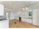 Spacious kitchen with white cabinets, stainless steel appliances and hardwood floors at 3524 Walker Is, Bradenton, FL 34208