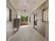 Shared condo hallway with access to a patio at 3544 Lake Bayshore Dr # K123, Bradenton, FL 34205