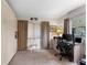 Home office with built-in wall unit, desk and comfortable chair at 3544 Lake Bayshore Dr # K123, Bradenton, FL 34205
